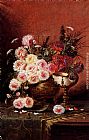 Still Life Of Roses And A Nautilus Cup On A Draped Table by Modeste Carlier